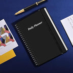 Daily Planner Undated - A5 To Do List Notebook Hourly Schedules, Spiral Appointment Planner for Women and Men, PVC Hardcover, Inner Pocket, Elastic Closure, 5.8" x 8.3", Black