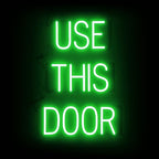 SpellBrite USE THIS DOOR Sign | Directional Sign with Neon Look, Green LED Light Source | 17.4" x 23.8"
