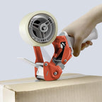 TAPEWELL Heavy Duty Metal Frame Orange Packing Tape Dispenser 3 Inch Core with Special Ergonomic Handle, Tape Gun for Packing Boxes with Premium Tempered Steel Blade - for 2 inch Wide Roll
