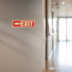 iSYFIX Exit Signs with Directional Left Arrow - 2 Pack 12x4 Inch Glow in the Dark for Business, School, Office, Warehouse - Durable 40 Mil Polystyrene, UV Laminated, Waterproof, Scratch & Fade Resistant