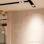 iSYFIX Exit Signs Stickers 12 Pack 12x4 Inch - Laminated Premium Vinyl Directional Left Arrow Signs for Buildings, Office, Workplace, Stores, Schools, Theaters, Parking, Restaurants, Factories
